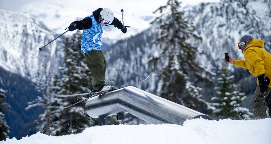 Young freestyler jumps over railings and is photographed doing so